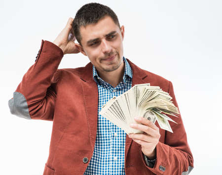 Upset man with money in hand