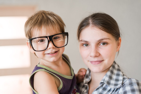 young mother with her son in her armsの写真素材