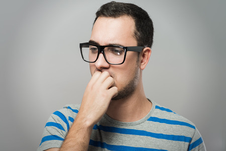 profile of a young business man thinkingの写真素材