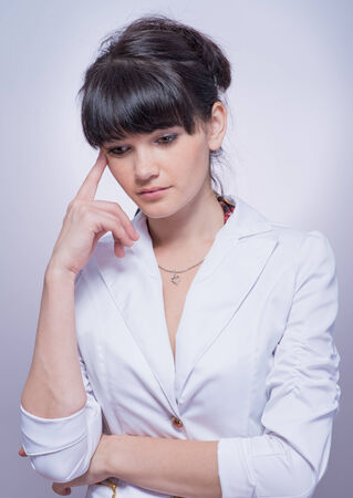young business woman thinkingの写真素材