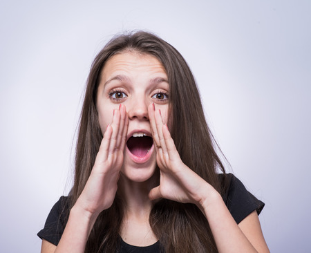 Close-up portrait of surprised beautiful girlの写真素材