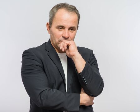Thoughtful businessman portraitの写真素材