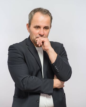 Thoughtful businessman portraitの写真素材