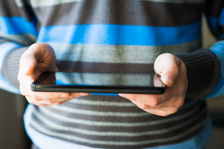 Businessman holding digital tabletの写真素材