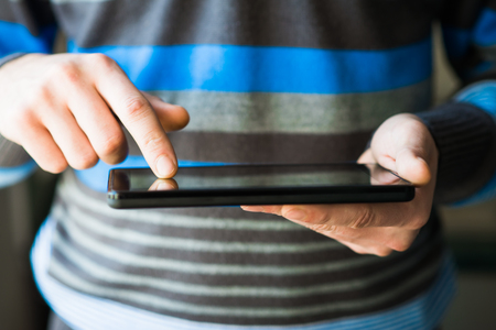 Businessman holding digital tabletの写真素材