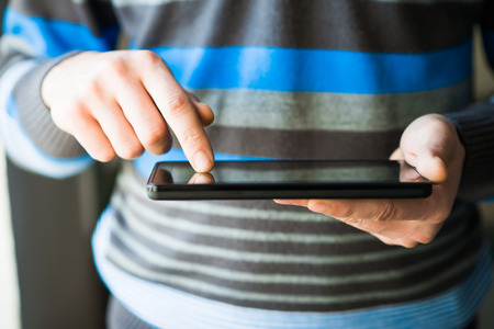 Businessman holding digital tabletの写真素材
