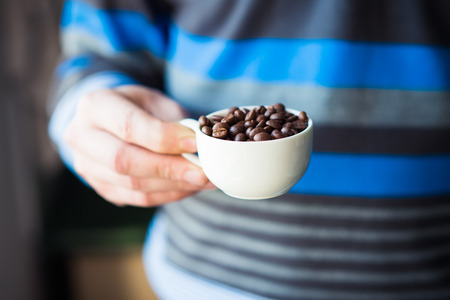 coffee grains of the handの写真素材
