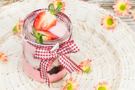 Ice cream . Delicious ice cream dessert with strawberries. Macro, selective focusの写真素材