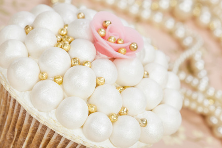 Wedding cupcake with sugar pearlsの写真素材