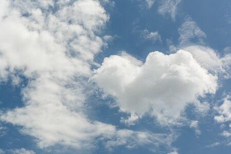 White puffy clouds with blue sky on sunny day in spring