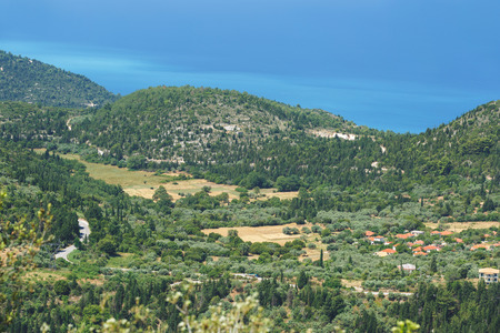 Village of Kalamitsi, Lefkada, Greece. Panoramic view on Kalamitsi village and Lefkada coast on a...
