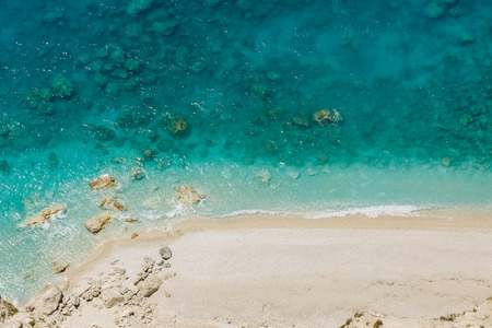 erial view of beautiful turquoise sea on white sand tropical beachの写真素材