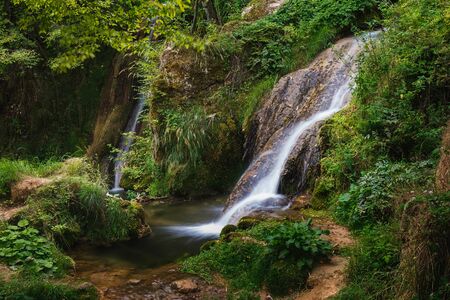 Waterfall in Gostilje village,  close up of cascades.  Nature outdoors travel destination Gostilje,  Zlatibor mountain, Serbiaの写真素材
