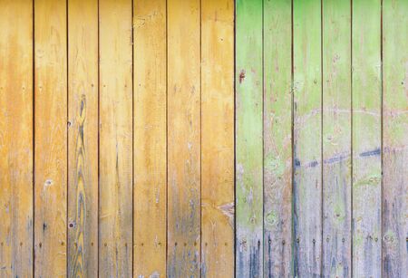 Vintage wood colors. Old wooden wall with a ragged colorsの写真素材
