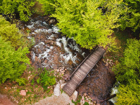 Bridge in the forest. Nature outdoors travel destination, Stara Planina (Balkan mountain), Serbia. Aerial, drone viewの写真素材