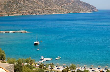 Yacht at the beach of luxury hotel, Crete, Greeceの写真素材
