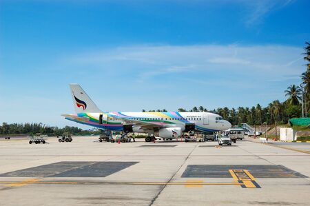 SAMUI, THAILAND - SEPTEMBER 9: The aircraft of Bangkok Airlines taking maintenance at Samui Airport on September 9, 2010 in Samui, Thailand. The flights to Samui island by Bangkok Air were established in year 2010のeditorial素材