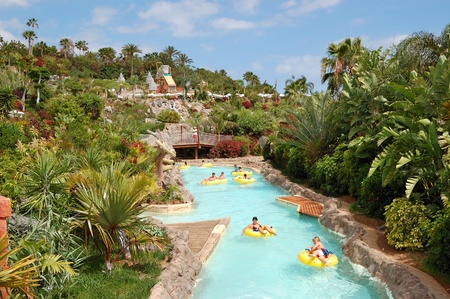 TENERIFE ISLAND, SPAIN - MAY 22: The tourists enjoying water attractions in Siam waterpark on May 22, 2011 in Tenerife, Spain. The Siam is the largest water theme park in Europe.のeditorial素材