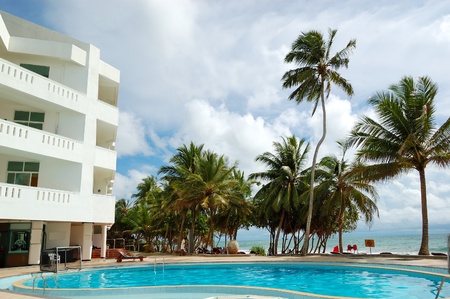 Swimming pool and beach at the popular hotel, Bentota, Sri Lankaのeditorial素材