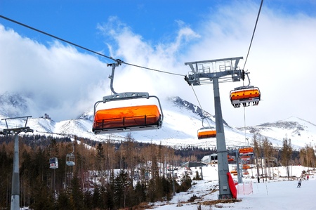 TATRANSKA  LOMNICA-MARCH 12: Cableway at Tatranska Lomnica. It is the popular ski resort in High Tatras with 6 km long dowhnill track, March 12, 2012 in Tatranska Lomnica, Slovakiaのeditorial素材