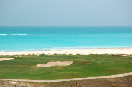 Golf field near beach of the luxury hotel, Saadiyat island, Abu Dhabi, UAEの写真素材