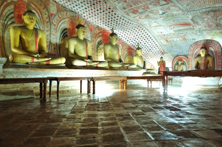 DAMBULLA - OCTOBER 15: Dambulla cave temple is the large cave temple complex with more than 80 documented caves and 153 Buddha statues. October 15, 2011 in Dambulla, Sri Lanka.のeditorial素材