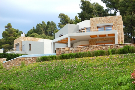 The luxury villa and green lawn, Halkidiki, Greece