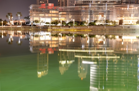 DUBAI, UAE - SEPTEMBER 9: The view on Burj Khalifa and man-made lake. It is the world's tallest skyscraper (height 828m, 160 floors) on September 9, 2013 in Dubai, UAEのeditorial素材