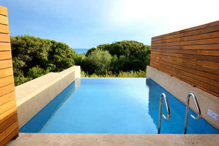 Sea view swimming pool by luxury villa, Peloponnes, Greeceのeditorial素材