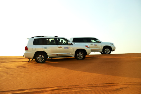 DUBAI, UAE - SEPTEMBER 12: The Dubai desert trip in off-road car is major tourists attraction in...