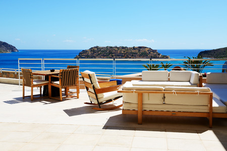 Sea view terrace at luxury hotel with a view on Spinalonga Island, Crete, Greeceのeditorial素材