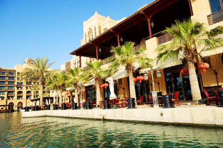 DUBAI, UAE - SEPTEMBER 9: View of the Souk Madinat Jumeirah. Madinat Jumeirah encompasses two hotels and clusters of 29 traditional Arabic houses on September 9, 2013 in Dubai, UAEのeditorial素材