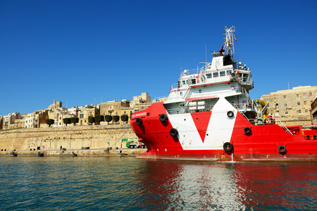 VALLETTA, MALTA - APRIL 22: The Vos Prudence offshore tug/supply ship is near pier on April 22, 2015...