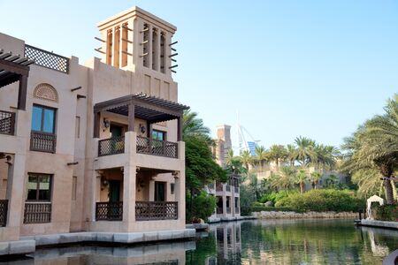 DUBAI, UAE - SEPTEMBER 9: View of the Souk Madinat Jumeirah. Madinat Jumeirah encompasses two hotels and clusters of 29 traditional Arabic houses on September 9, 2013 in Dubai, UAEのeditorial素材