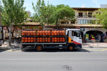 MALLORCA, SPAIN - MAY 29: The track with Repsol propane bottled gas is on street on May 29, 2015 in Mallorca, Spain. Up to 60 mln tourists is expected to visit Spain in year 2015.のeditorial素材