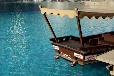 DUBAI, UAE - NOVEMBER 19: The traditional Abra boat for tourists transportation in Dubai downtown on November 19, 2017のeditorial素材