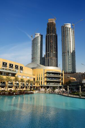DUBAI, UAE - NOVEMBER 19: The Dubai Mall is the worlds largest shopping mall and construction of new skyscrapers.  It is located in Burj Khalifa complex and has 1200 shops inside on November 19, 2017のeditorial素材