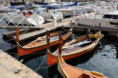 BIRGU, MALTA - APRIL 24: The traditional wooden  Maltese boats for tourists cruises on April 24,...