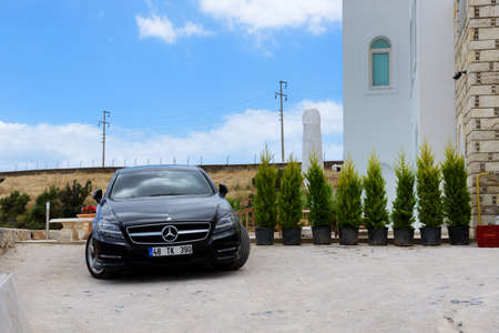 BODRUM, TURKEY - MAY 23: The Mercedes-Benz CLS-Class car is parked near villa on May 23, 2013 in Bodrum, Turkey. More then 36 mln tourists have visited Turkey in year 2013のeditorial素材