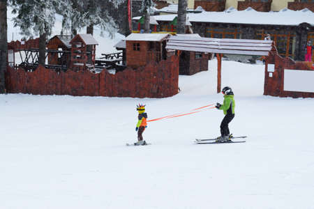 The training of young skier is on Biela Put slope in Jasna Low Tatras, Jasna, Slovakiaの写真素材
