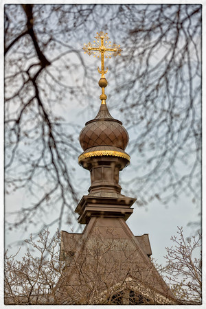 Orthodox Church of Kiev In the botanical garden crosses tend to heaven around trees blossomの写真素材