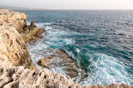 Waves sea cliffs cyprusの写真素材