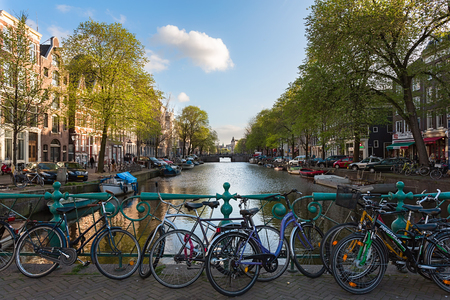 Bikes on the street in Amsterdam, Netherlandsの写真素材
