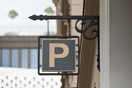 Parking sign on the houseの写真素材