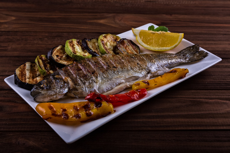 grilled trout with vegetablesの写真素材