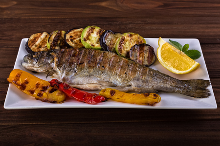 grilled trout with vegetablesの写真素材