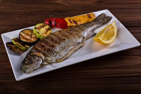 grilled trout with vegetablesの写真素材