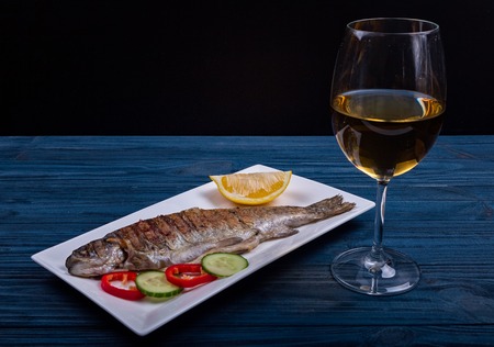 grilled trout with vegetablesの写真素材