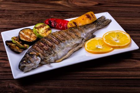 grilled trout with vegetablesの写真素材