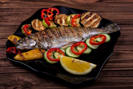 grilled trout with vegetablesの写真素材
